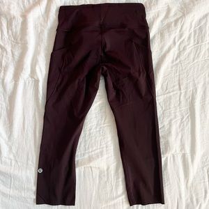 Lululemon crop leggings. Pockets. Silky material. Dark maroon.